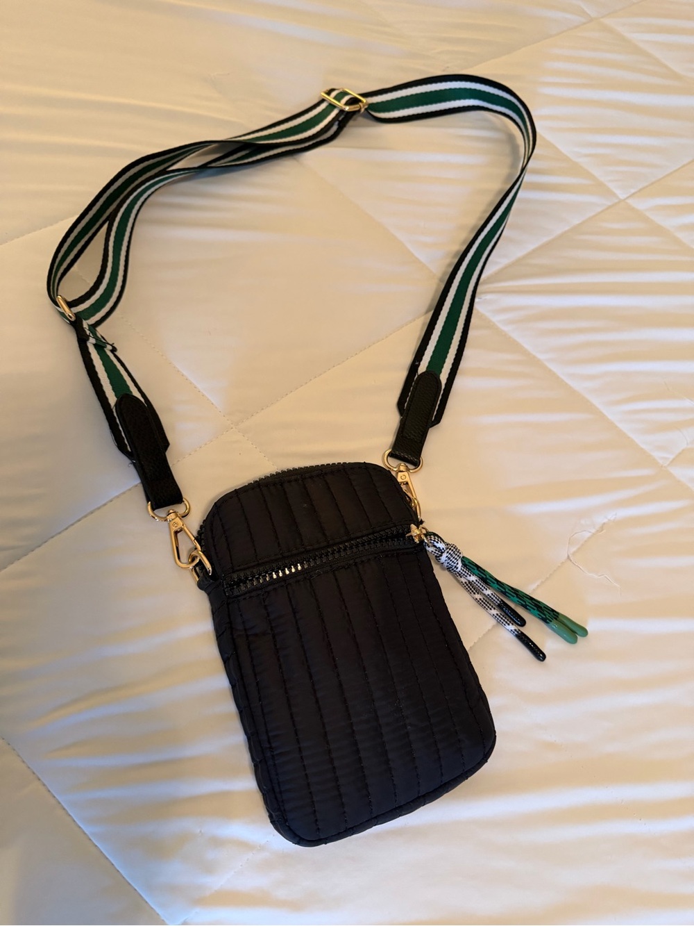 Quilted Black Crossbody Phone Pouch with Green-Striped Strap